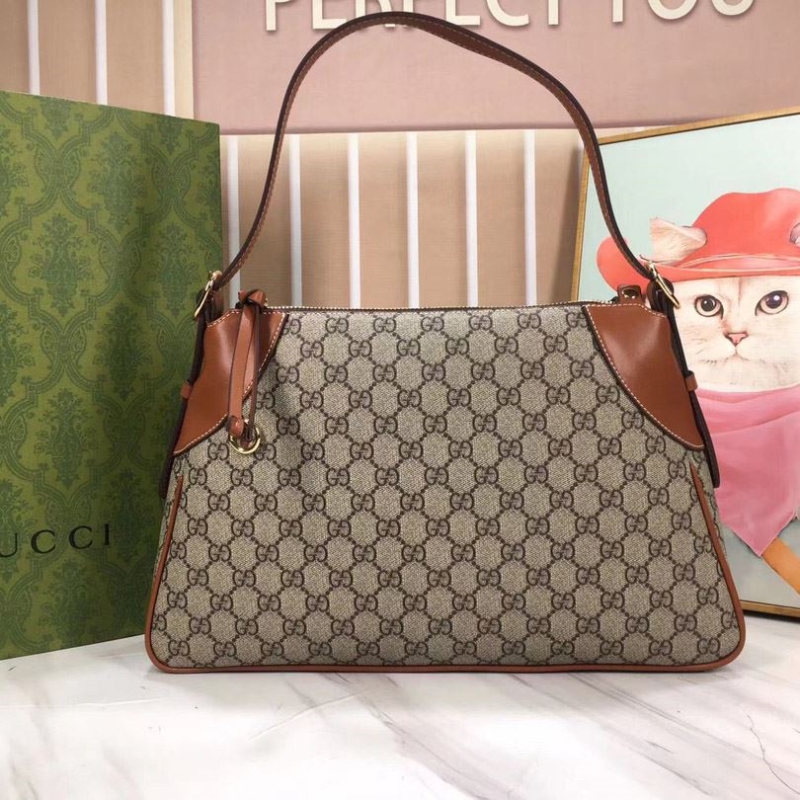 G*u*i top handle bags